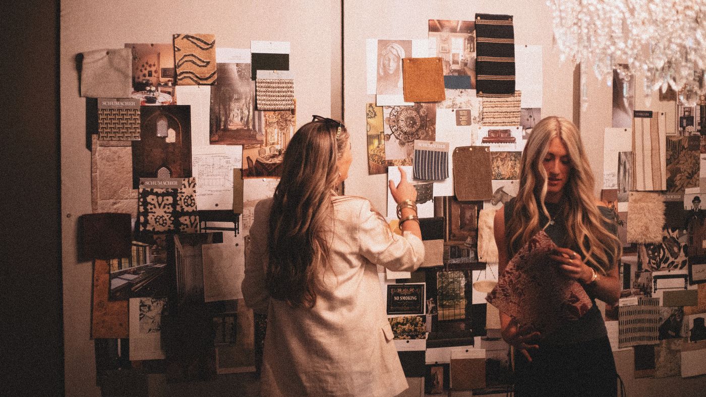 Designers working on a mood board in a studio